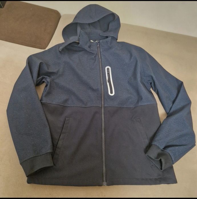 Geaca impermeabila, 14 ani