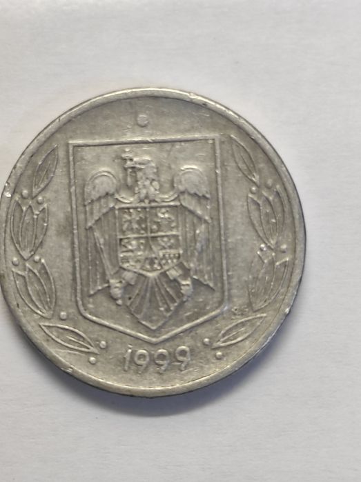 Vând monedă de 500 lei din 1999.