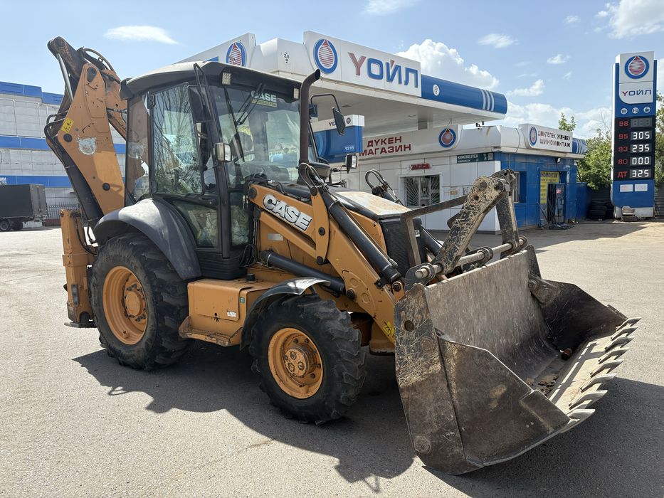 Продам Эксковатор погрузчик 3в1 петушок