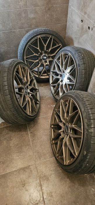 Vand set 4 jante aliaj Dots Suzuka Bronze 18" + anvelope Pirelli