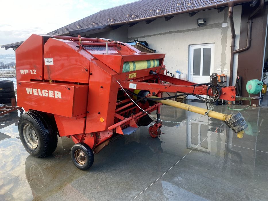 Presa balotat balotiera rotunda Welger Rp 12 ata si plasa