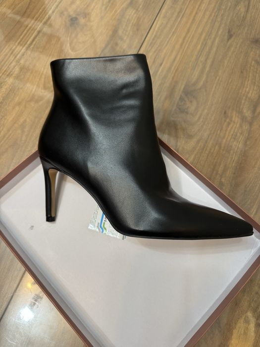 Продается новые сапоги