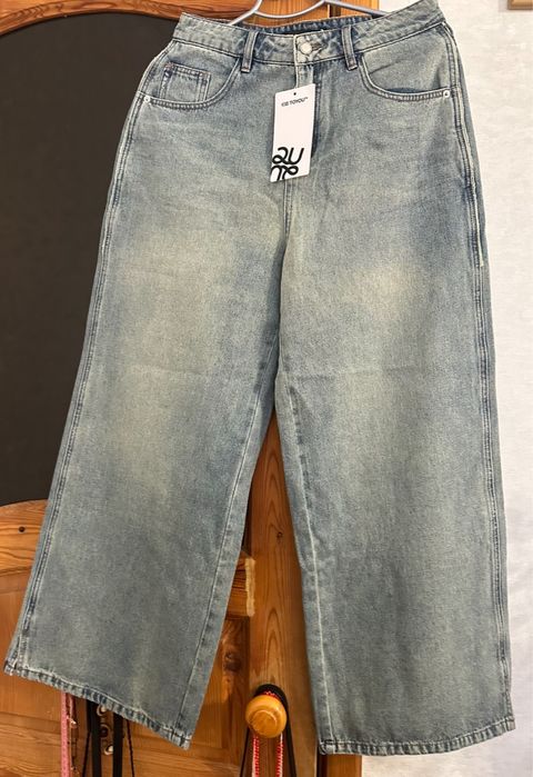 Женские джинсы р 48