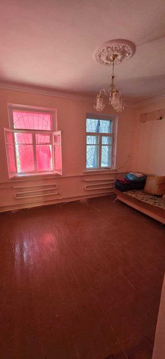 Дом в г. Янгиюле с участком