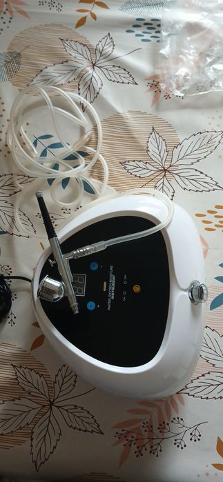 Aparat facial de cosmetica