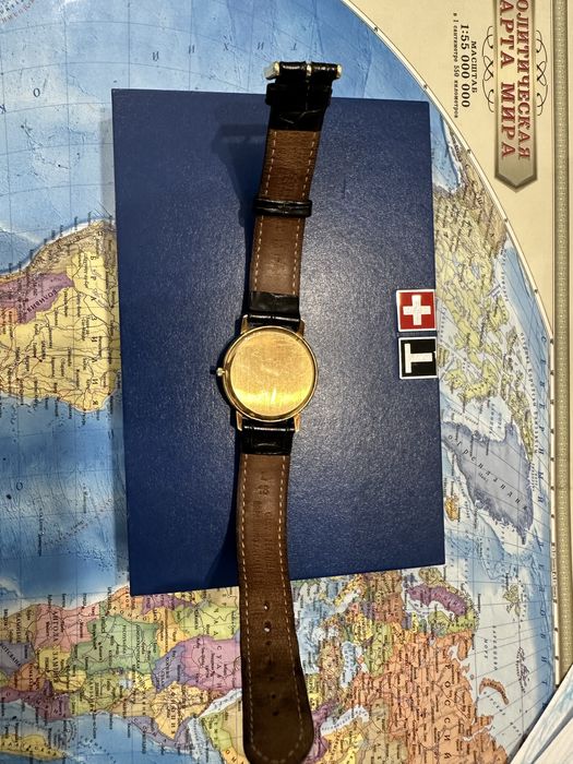 Часы золотые Tissot Тиссот