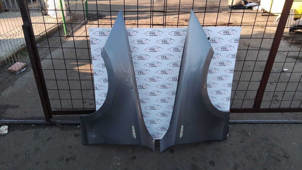 Aripa stanga/dreapta fata BMW Seria 1 E87 an 2009