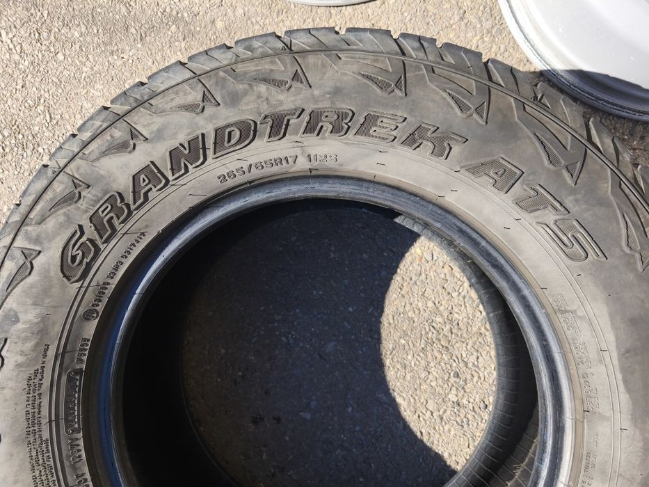 265/65/17" 4бр Dunlop grandtrek AT/S,dot3023,9mm