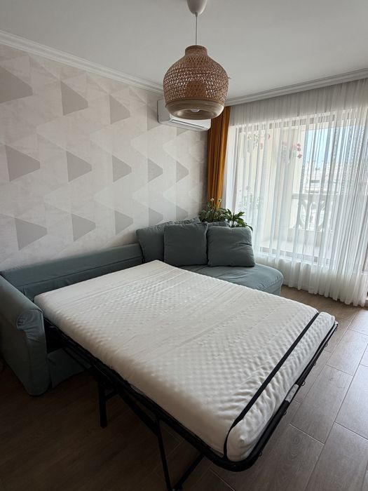 Ратегателен диван IKEA с перящи калъфи