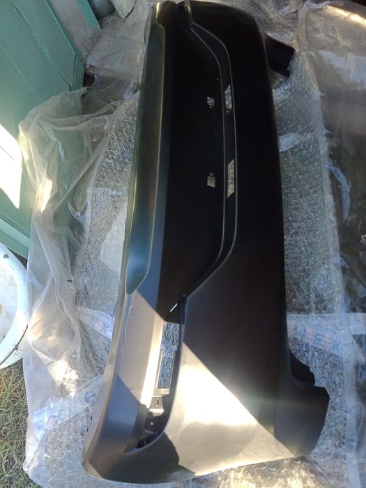 Бампер задний на Kia Rio