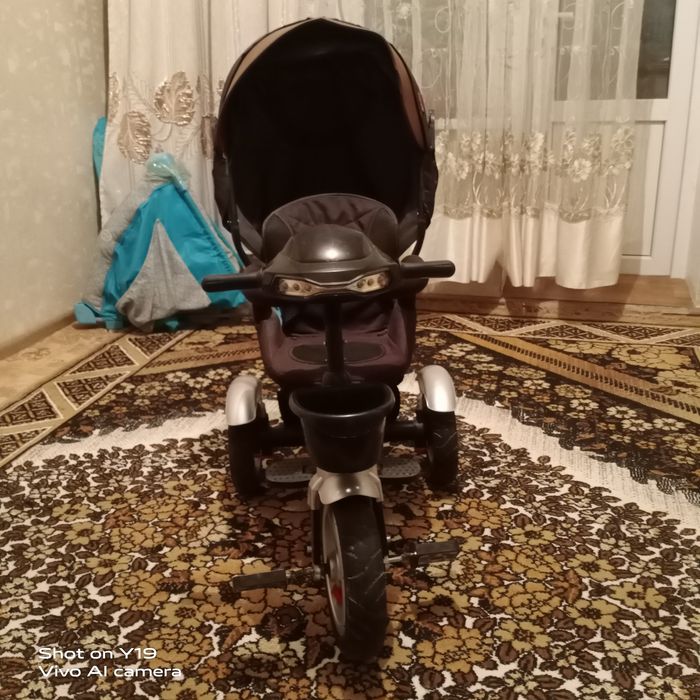 Детский велосипед с управлением