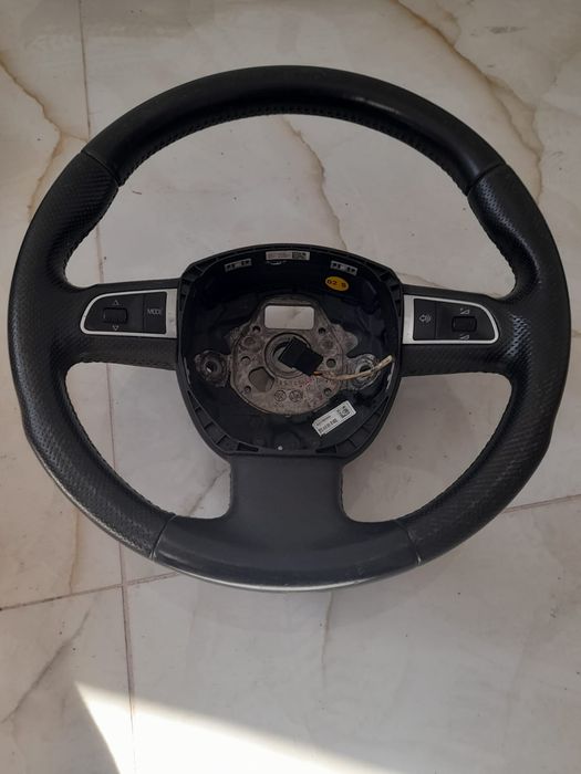 Volan Sport Audi A4 B8, A5 8T, Q5 Piele Perforată cu Comenzi + un airbag  are padele + cotiera + stopuri