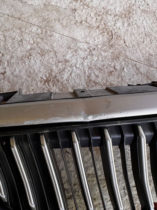 Решотка Geely Emgrand