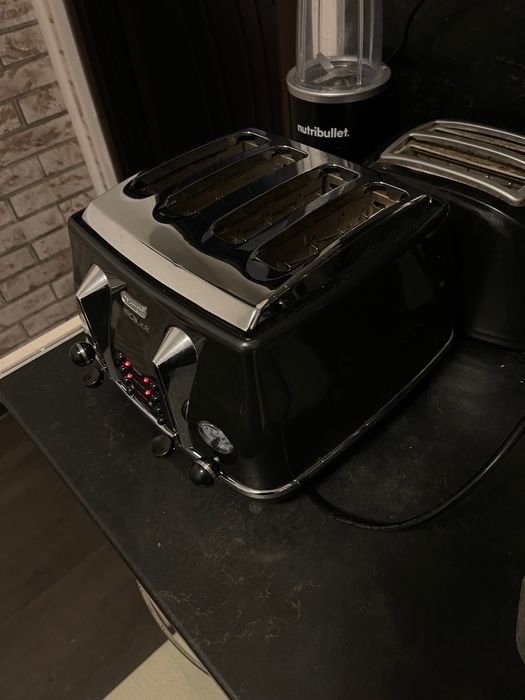 Тостер Delonghi с четири гнезда