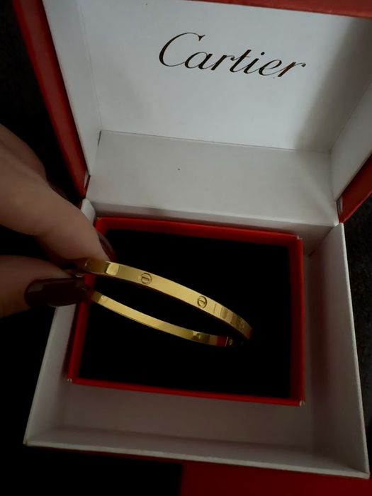 Гривна - Cartier