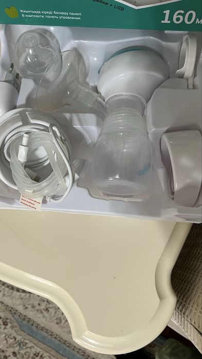 Электрический молокоотсос