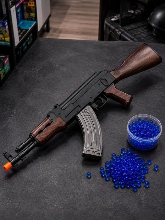 Игрушечный автомат стреляет арбизами
