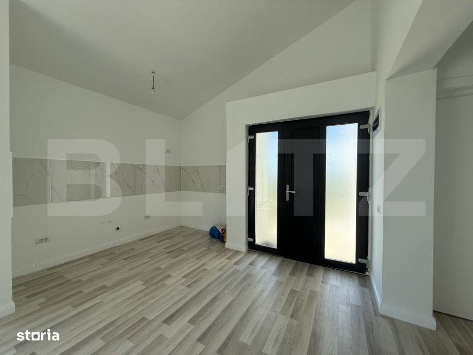 Casa pe parter cu un design deosebit, zona nordica / Simnicul de Jos