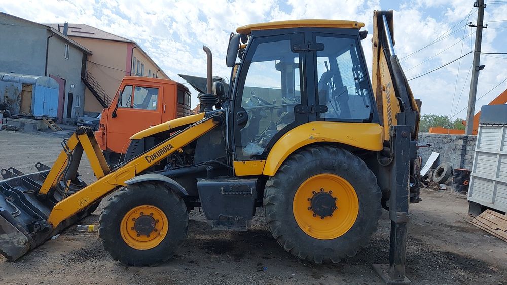 Услуги экскаватора погрузчика