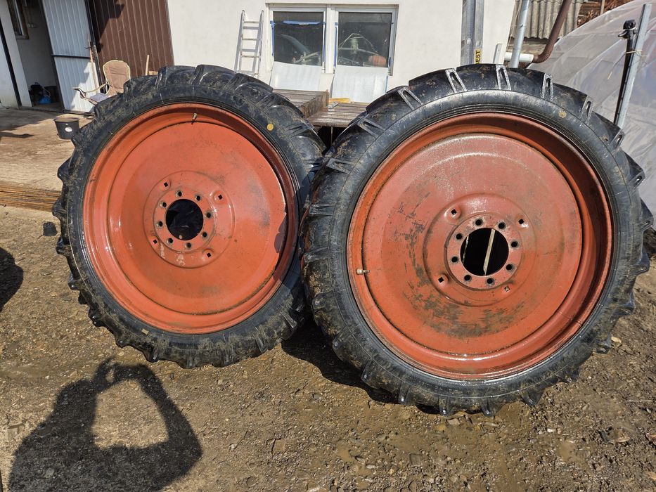 Rotii inguste 9.5/42 ,cauciucurile aproape noua,pentru Belarus si UTB