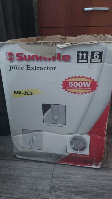 Электрическая соковыжималка