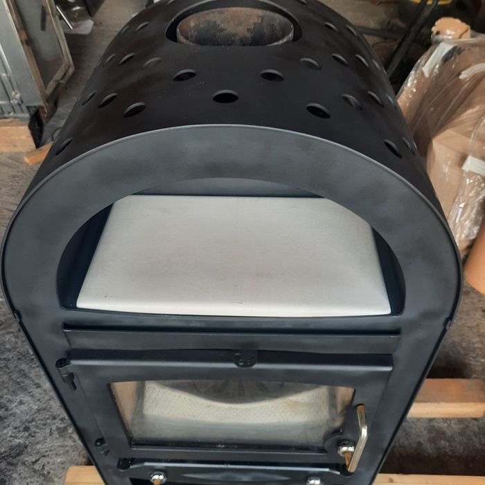 Soba tip șemineu de 8 kw  focar șamotat marca germana