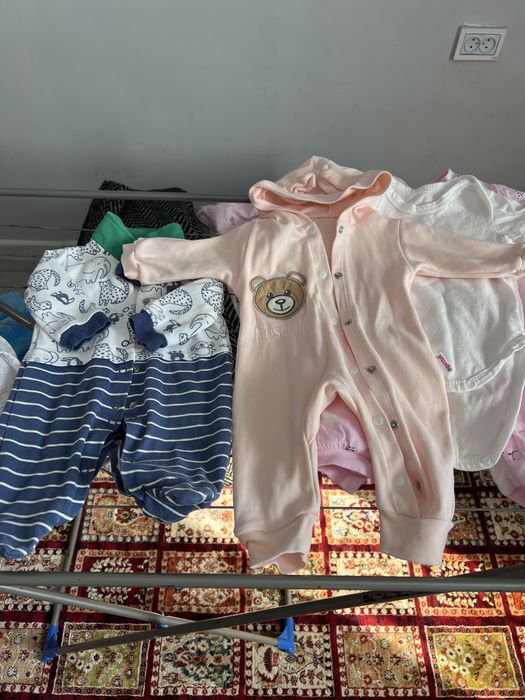 Детская одежда на новорожденного