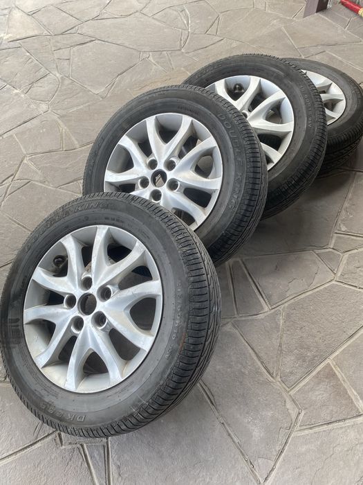 Продам летние шины с дисками 215/60 R16