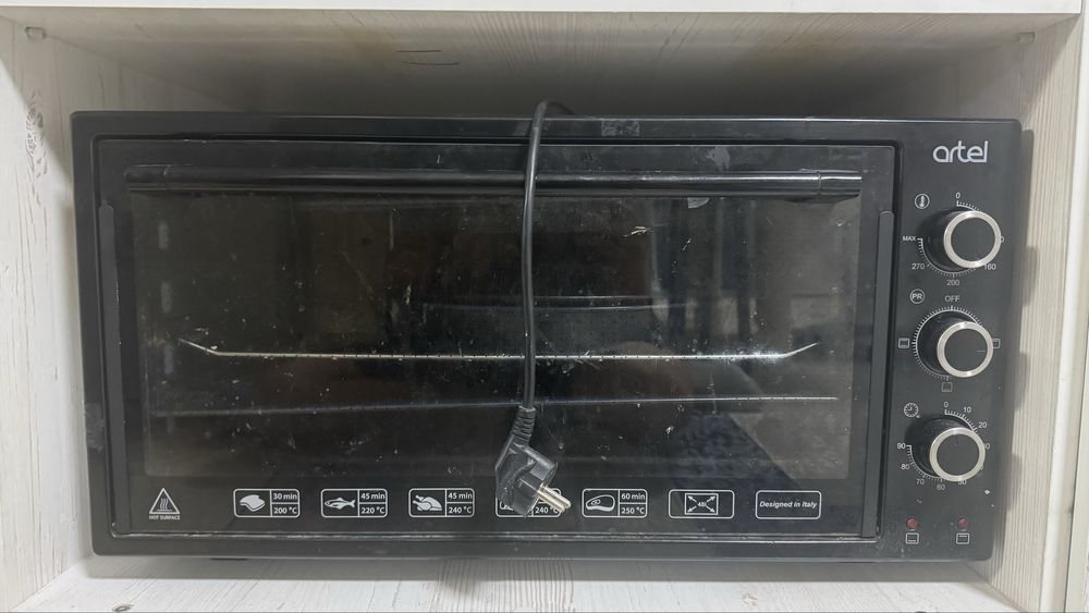 Духовка artel.