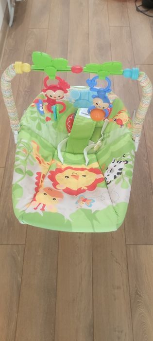 Бебешки шезлонг с играчки