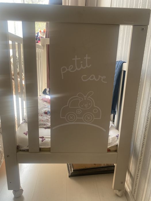 Кроватка-манеж для малыша