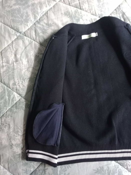 Рюкзак и теплая кофточка