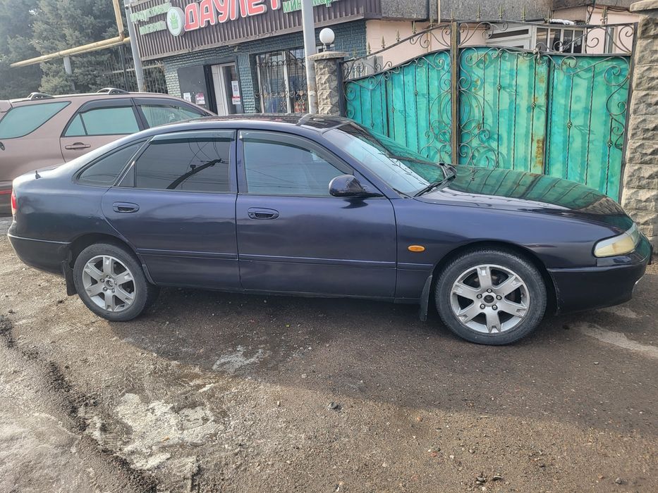 Автомобиль мазда кронос