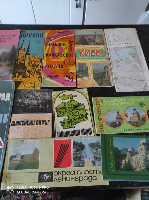 Наборы открыток и схемы городов.