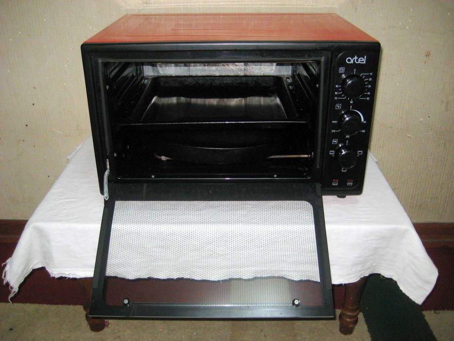 Печь духовка 40лт деярли янги куп ишламаган почти новая малоползвано!