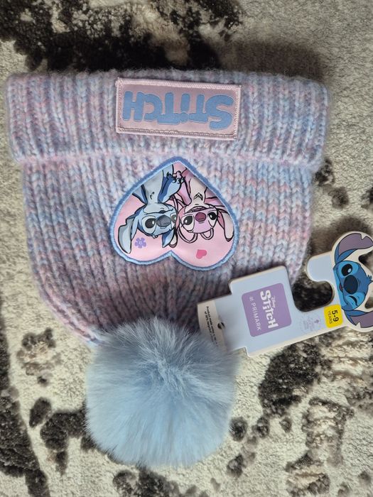 Caciula noua cu eticheta 5-9ani pe eticheta dar recomand 3-6ani
Stare