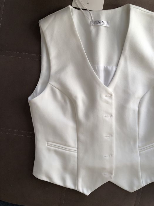 Женская жилетка.