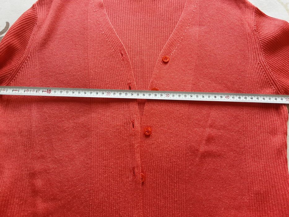 Жилетки, сако и пончо