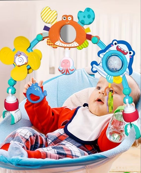 Игрушка дуга на коляску