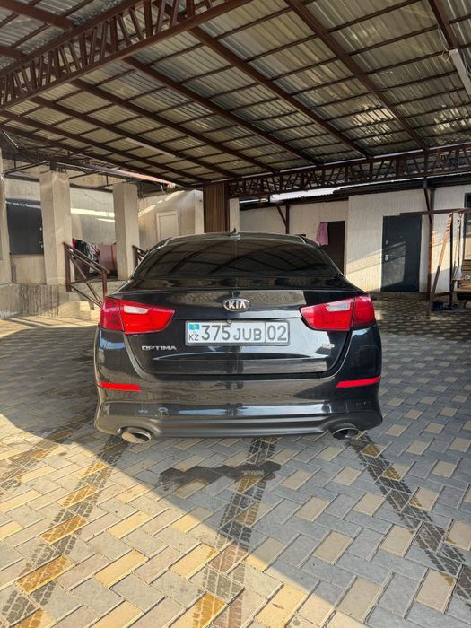 Kia optima 2014 года