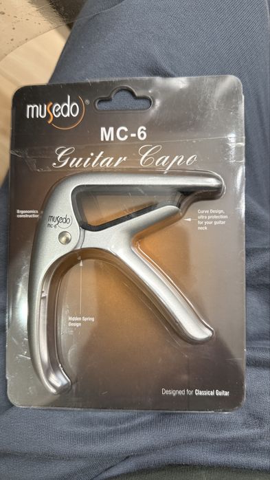 Каподастр для гитары