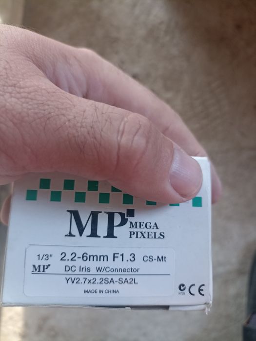 Объектив на камеру наблюдения