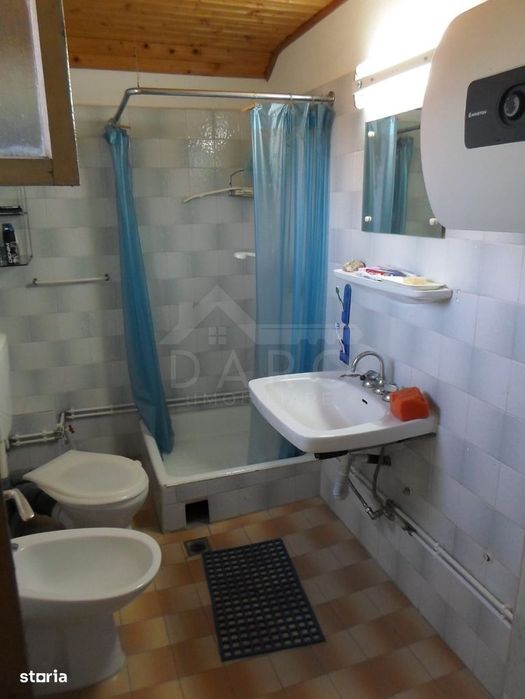 Casă cu etaj , de cărămidă, pe teren de  1680 M2, intabulat și  c