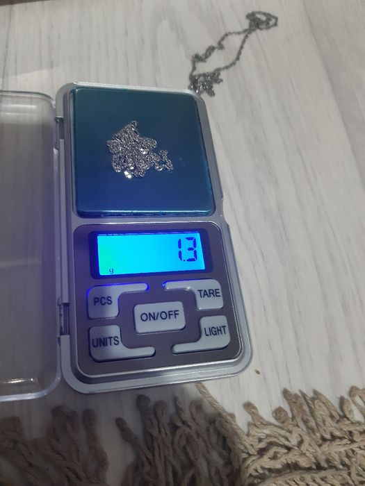 Серебрянные цепочки и кулон