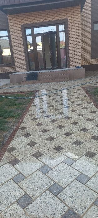 Укладка тротуарной плитки брусчатка