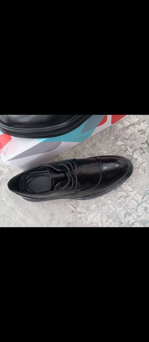 Продам туфли новые