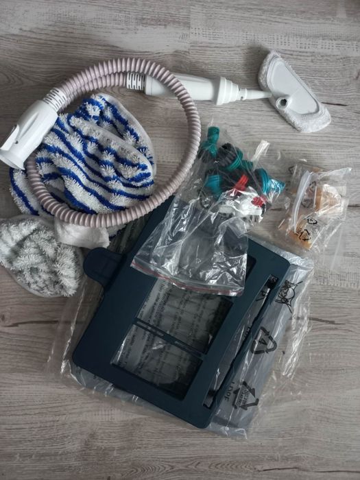 Vand aspirator vertical cu abur Rowenta