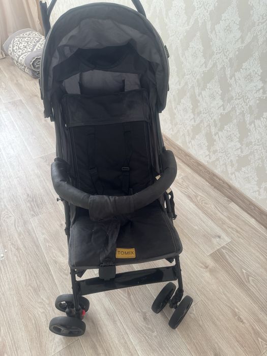 Прогулочная коляска фирмы Tomix