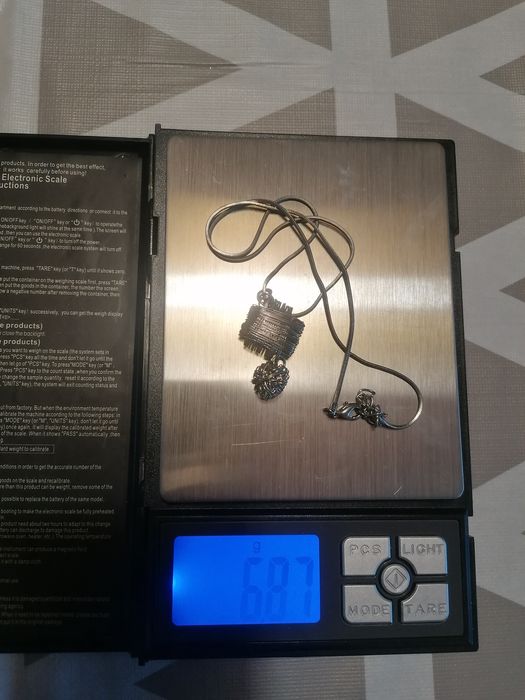 Colier cu medalion din argint, 6.87 gr, model foarte frumos și fin,