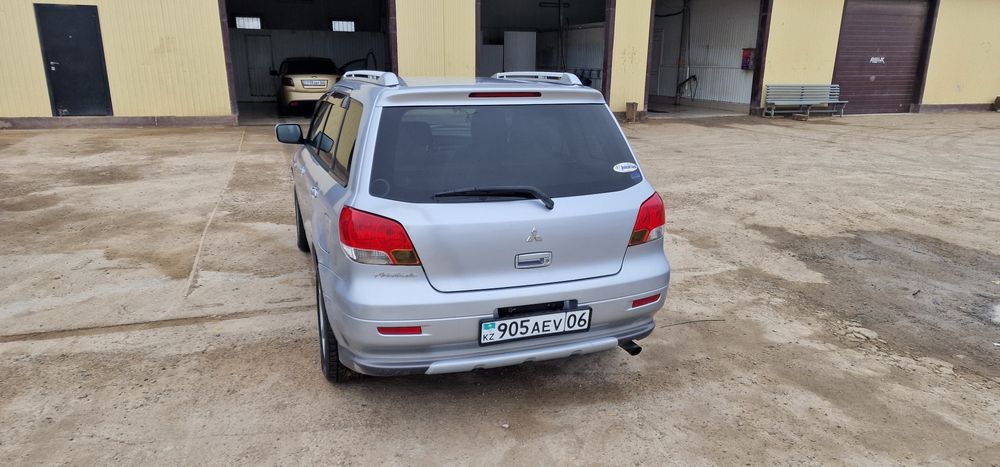 митсубиси айртрек 2003